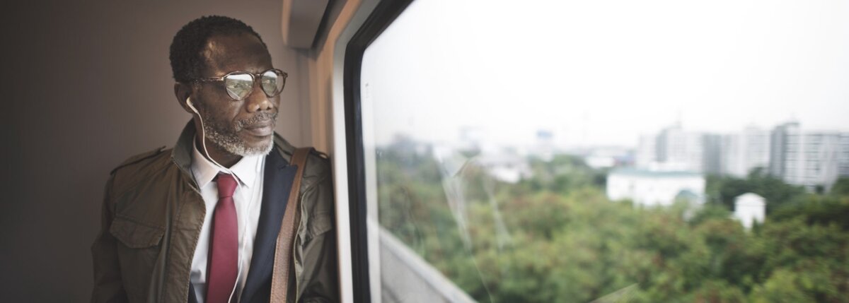Man looking out of train