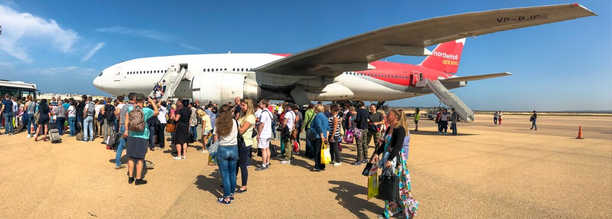 People queuing for plane